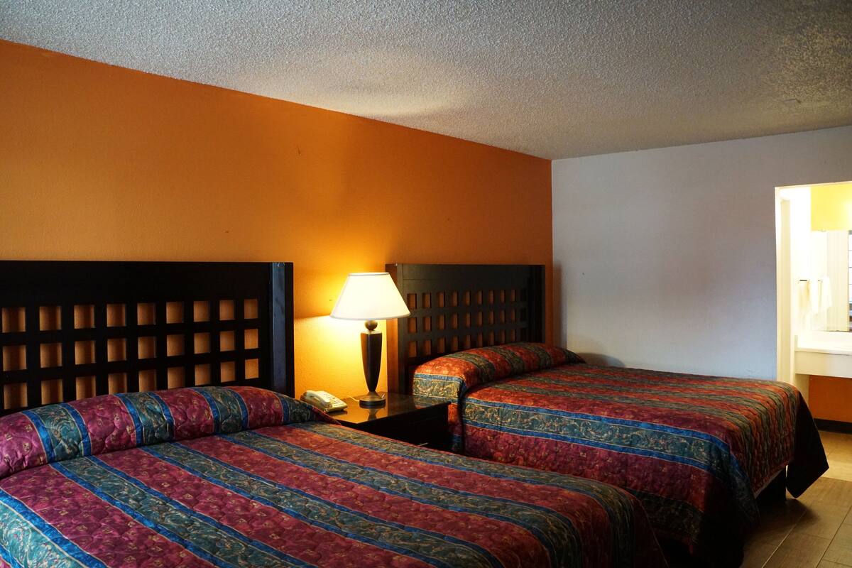 Standard Room, 2 Double Beds | Desk, WiFi (free), bed sheets