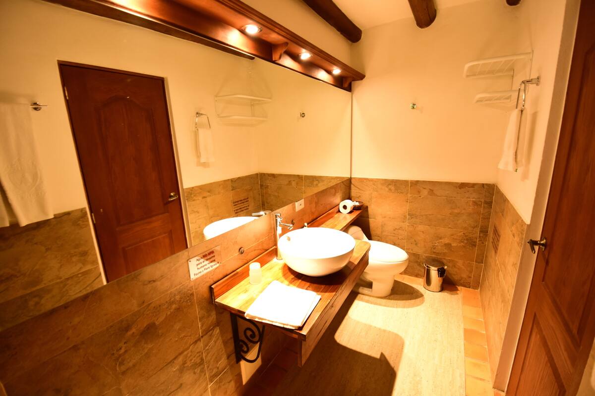 standard double room | bathroom | jetted bath, rainfall showerhead, free toiletries, hair dryer