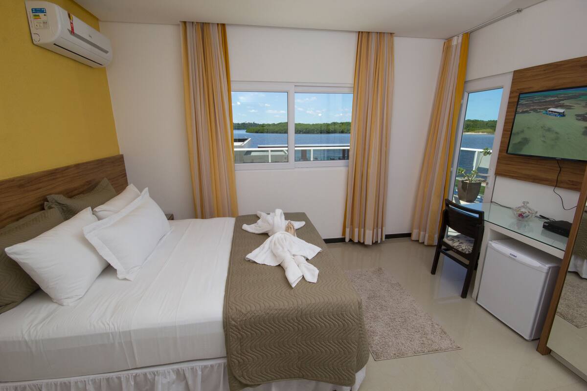 Luxury Room, Balcony | Minibar, in-room safe, individually decorated, blackout curtains