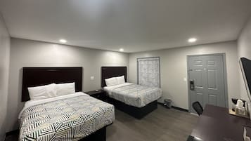 Desk, laptop workspace, free WiFi, bed sheets