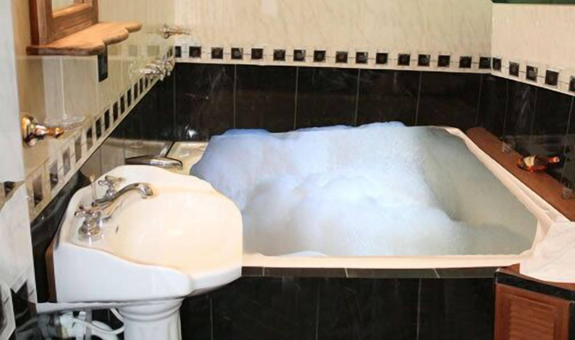 suite | bathroom | shower, towels