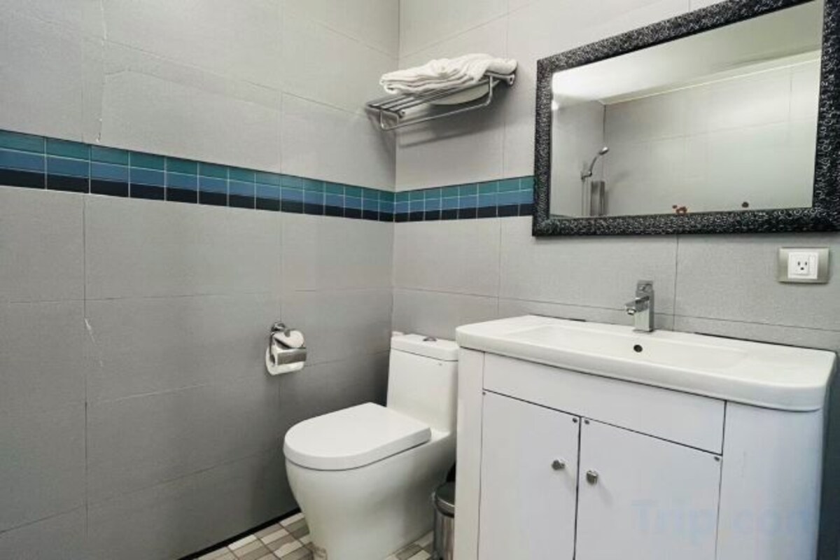 Bathroom | Hair dryer, slippers, towels, shampoo