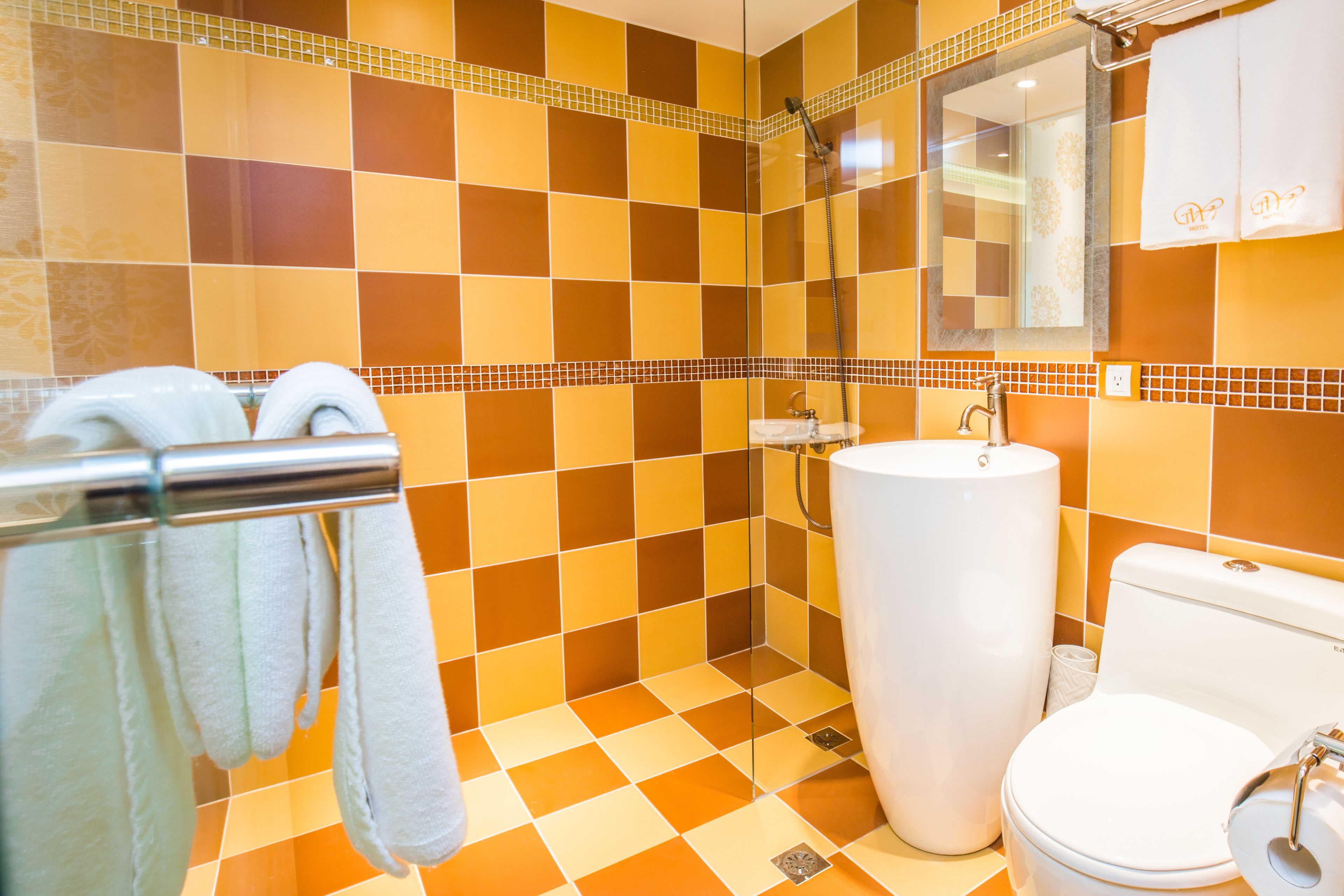 hair dryer, slippers, towels, shampoo