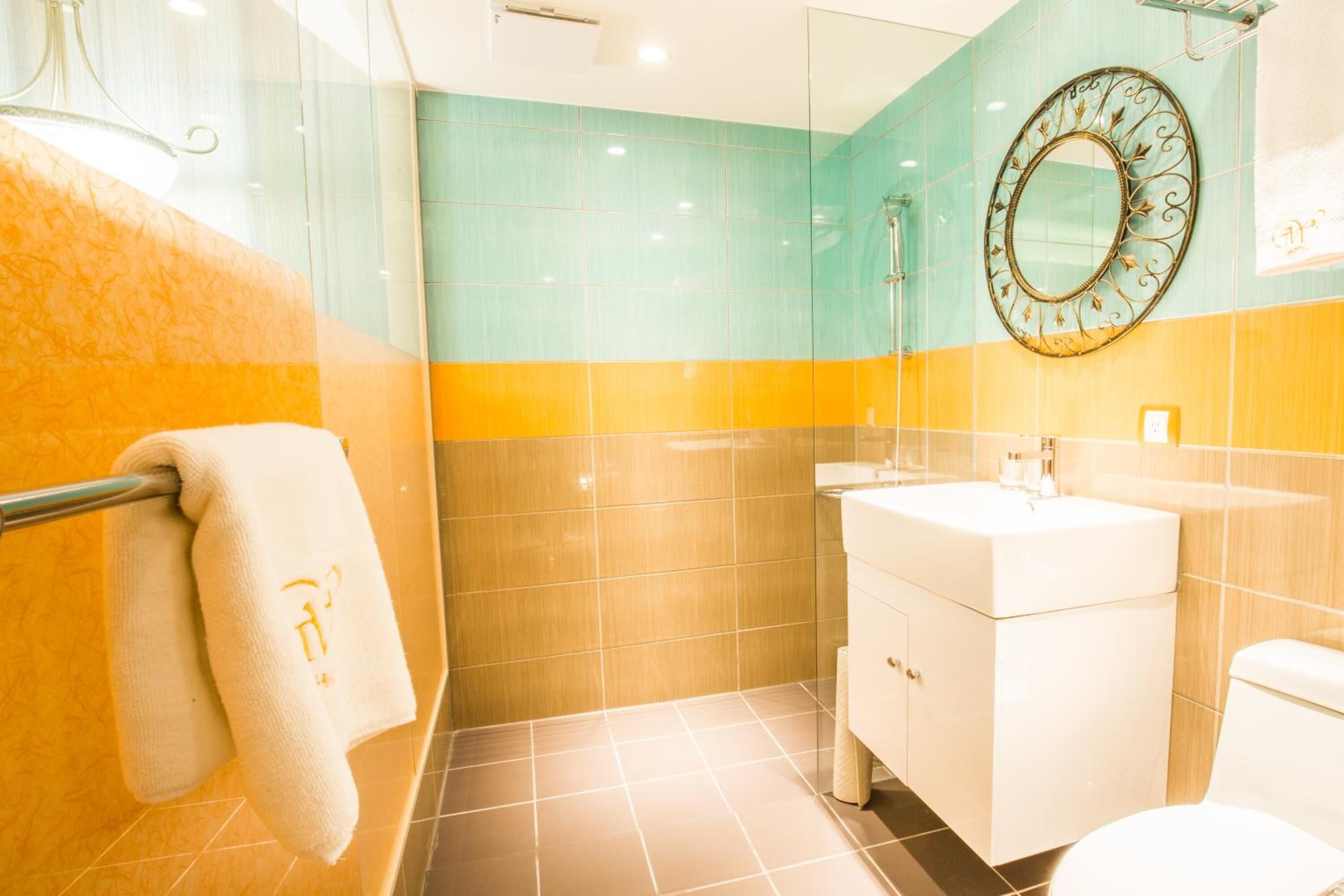 hair dryer, slippers, towels, shampoo