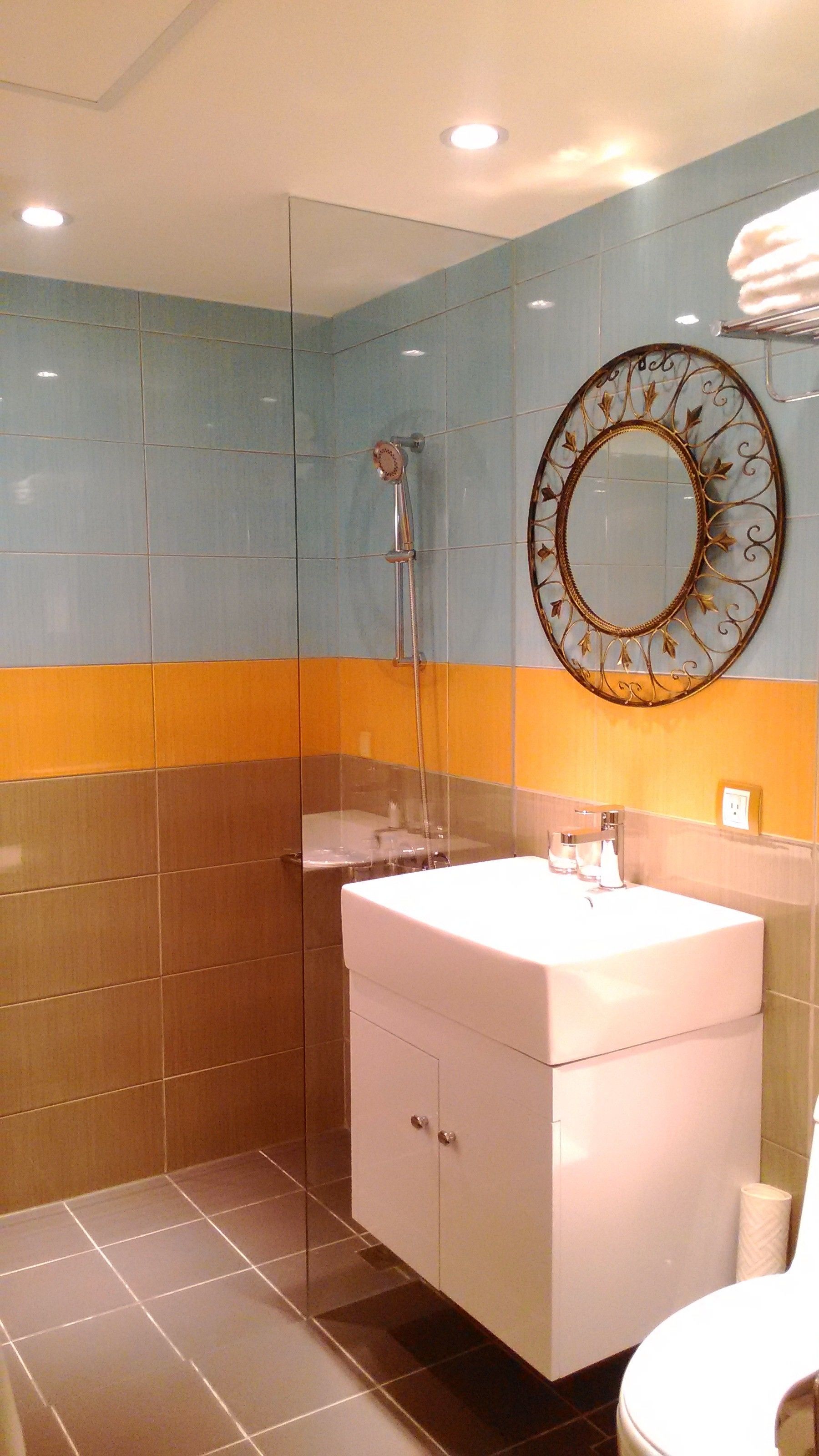 superior double room (extreme sassy) | bathroom | hair dryer, slippers, towels, shampoo