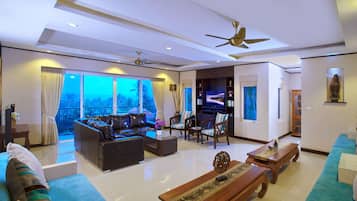 50-inch flat-screen TV with satellite channels, LCD TV, DVD player