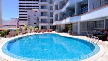 Outdoor pool, pool umbrellas, pool loungers