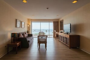 Suite, Sea View | Living area | 25-inch LCD TV with cable channels, TV - Sandy Spring Hotel (Pattaya)