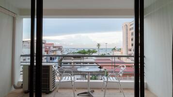 Grand Room, Sea View | Living area | 25-inch LCD TV with cable channels, TV