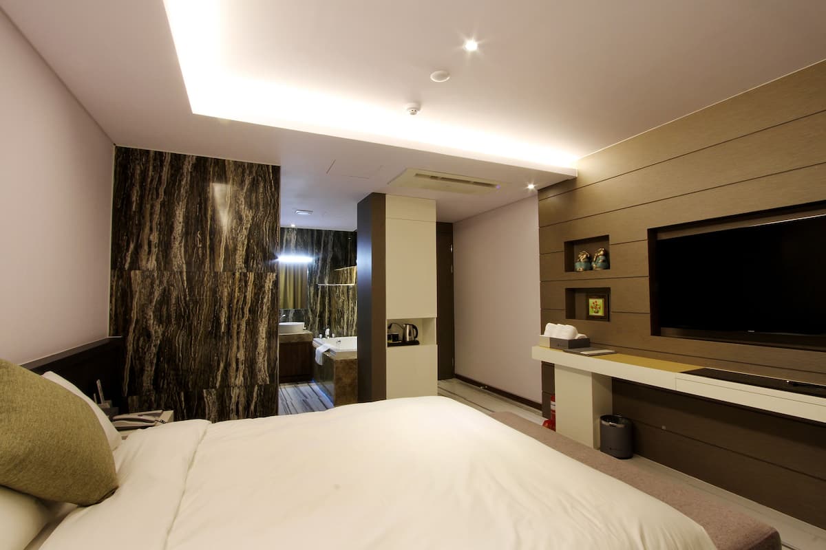 Premium bedding, down duvets, memory-foam beds, individually decorated