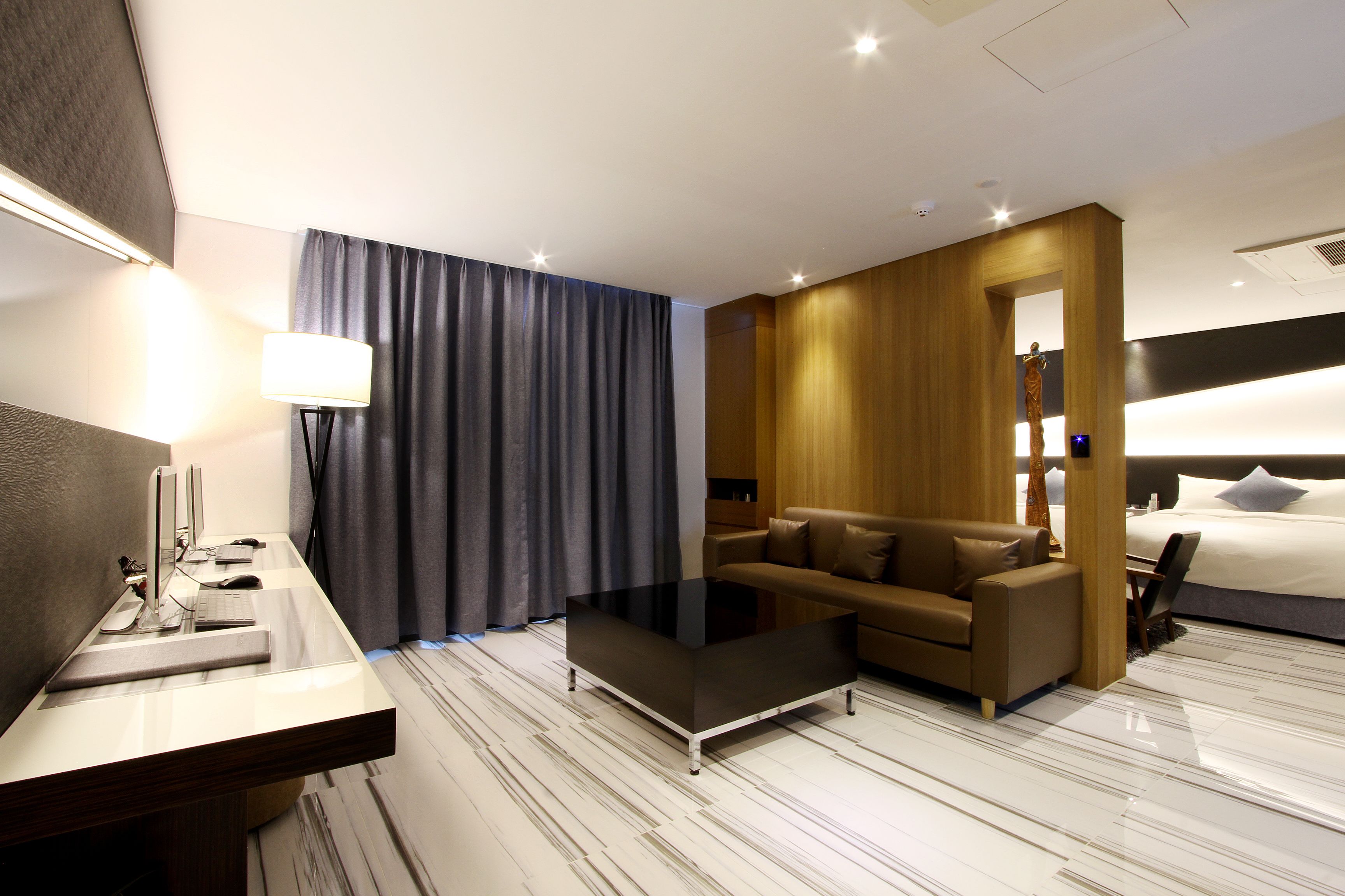Suite | Living area | 50-inch LED TV with cable channels, TV, tablet