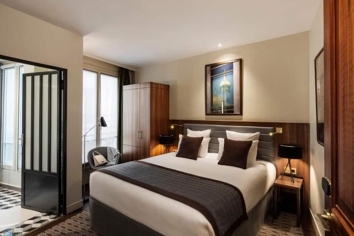 Quarto clássico | 1 quarto, roupas de cama premium, frigobar, cofres nos quartos