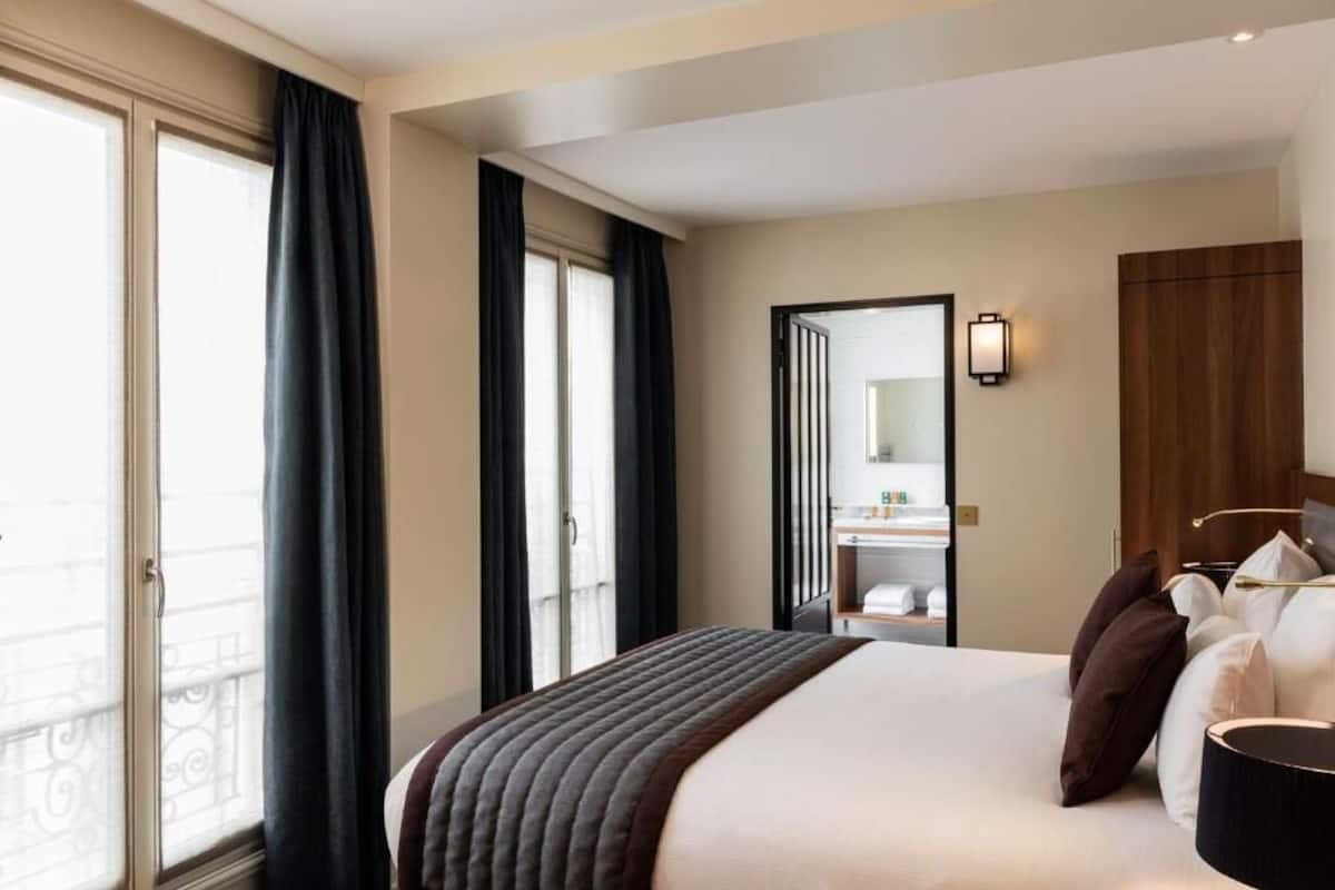 Quarto superior | 1 quarto, roupas de cama premium, frigobar, cofres nos quartos