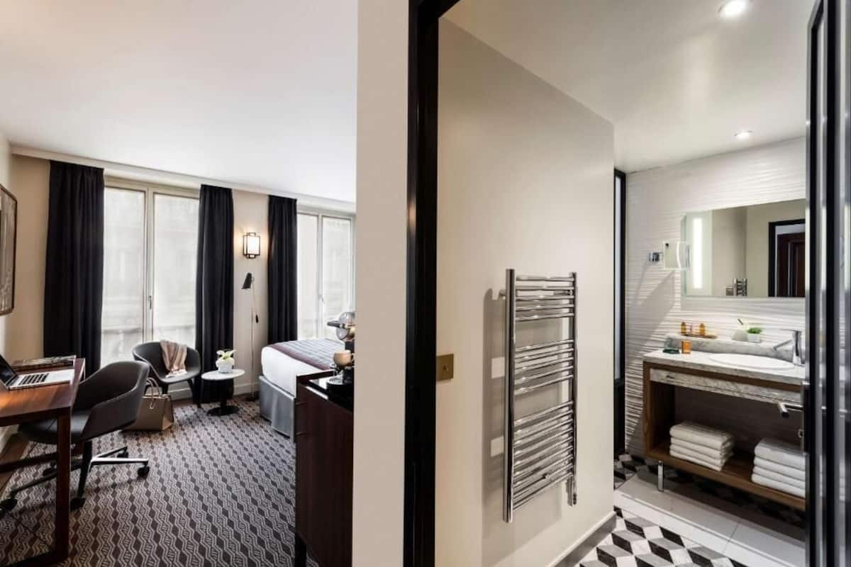 1 quarto, roupas de cama premium, frigobar, cofres nos quartos