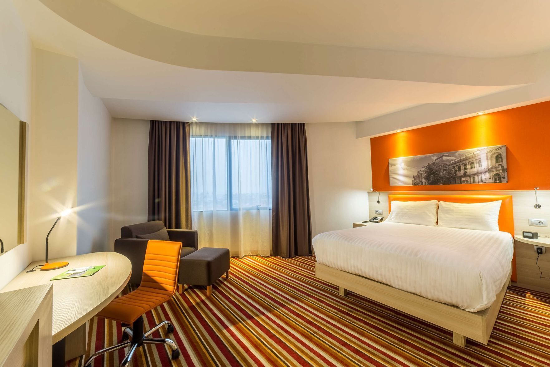 Premium bedding, in-room safe, desk, soundproofing