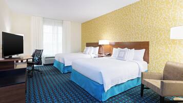 Desk, blackout drapes, iron/ironing board, free cribs/infant beds