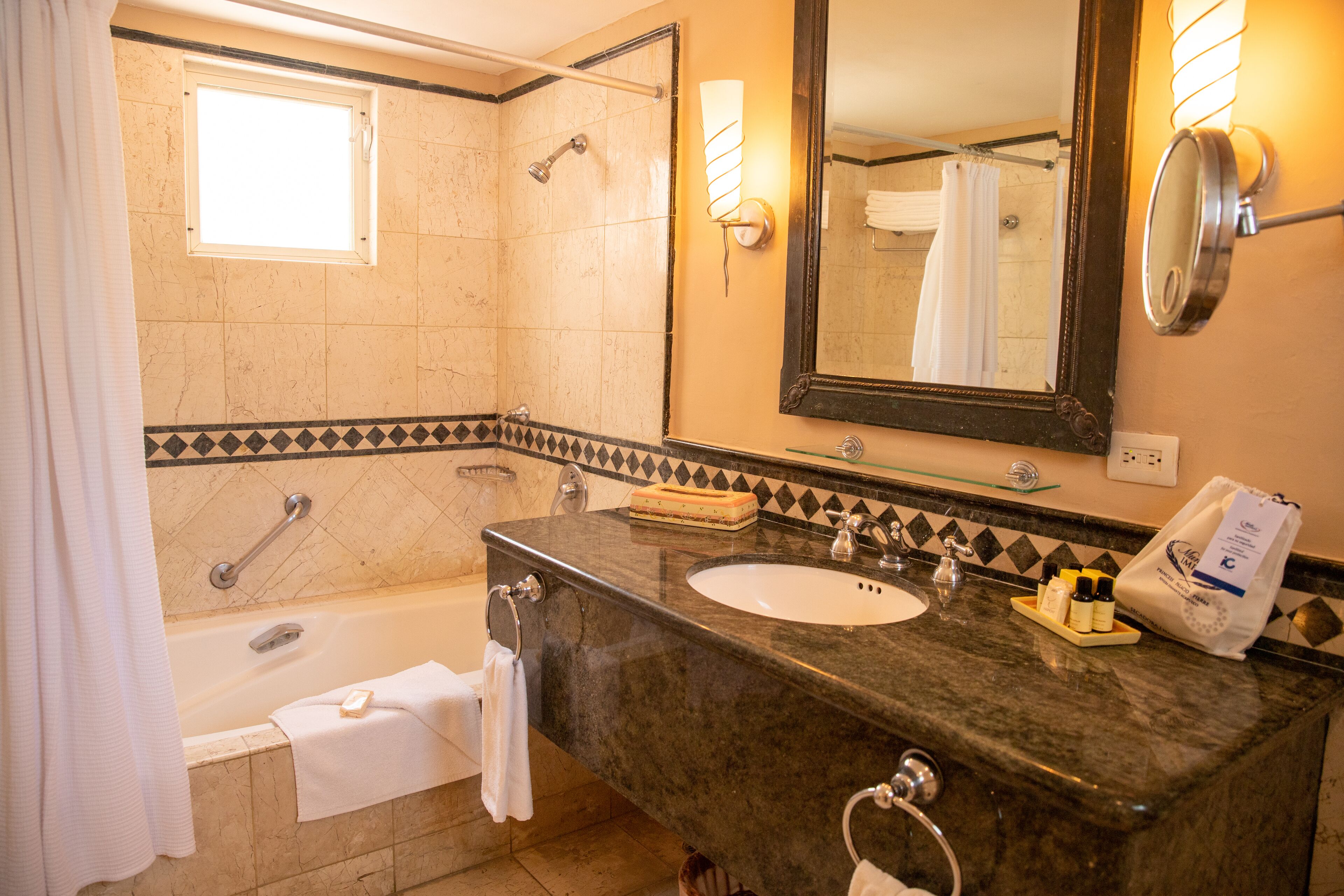 elite room, 1 king bed, garden view | bathroom | shower, hair dryer, bathrobes, towels