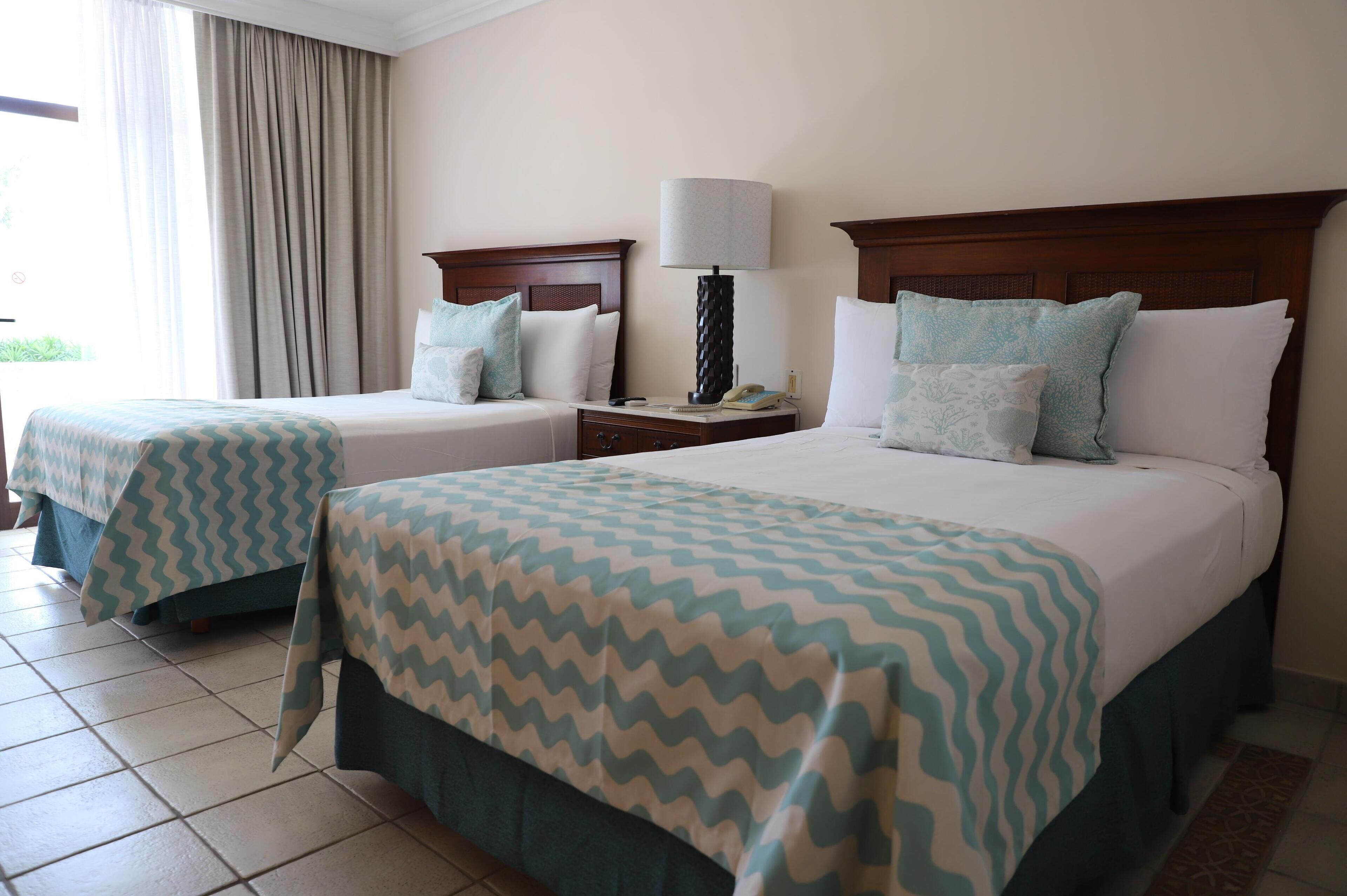 Sengetøy av topp kvalitet, safe på rommet og strykejern/-brett