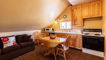 Suite, 1 Bedroom | Living area | TV