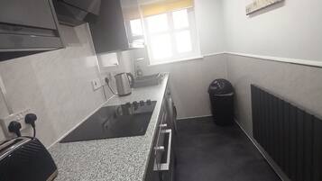 Standard Apartment, 1 Bedroom | Private kitchenette | Full-sized fridge, microwave, oven, stovetop