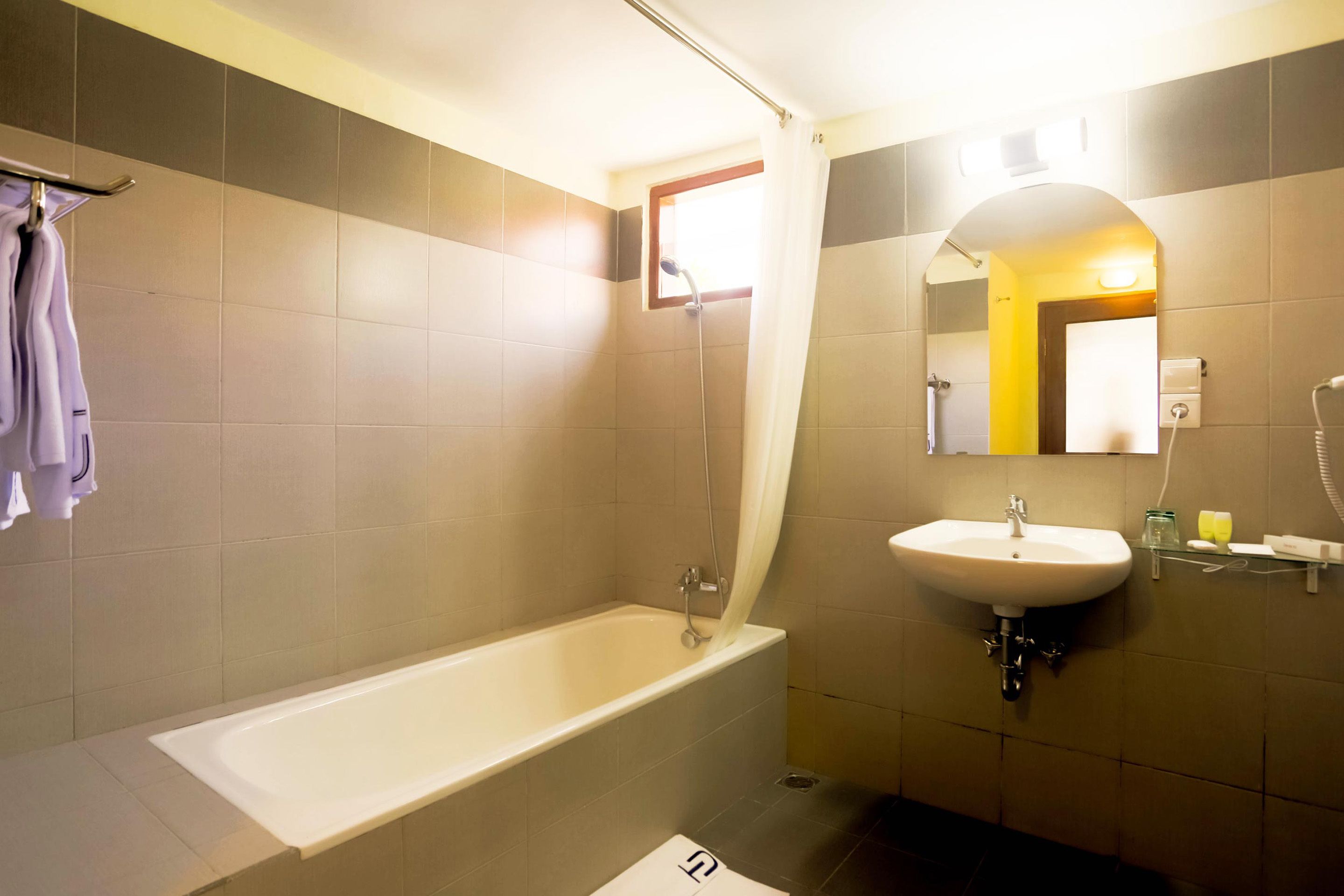 deluxe one bedroom | bathroom | separate bathtub and shower, deep-soaking bathtub, free toiletries