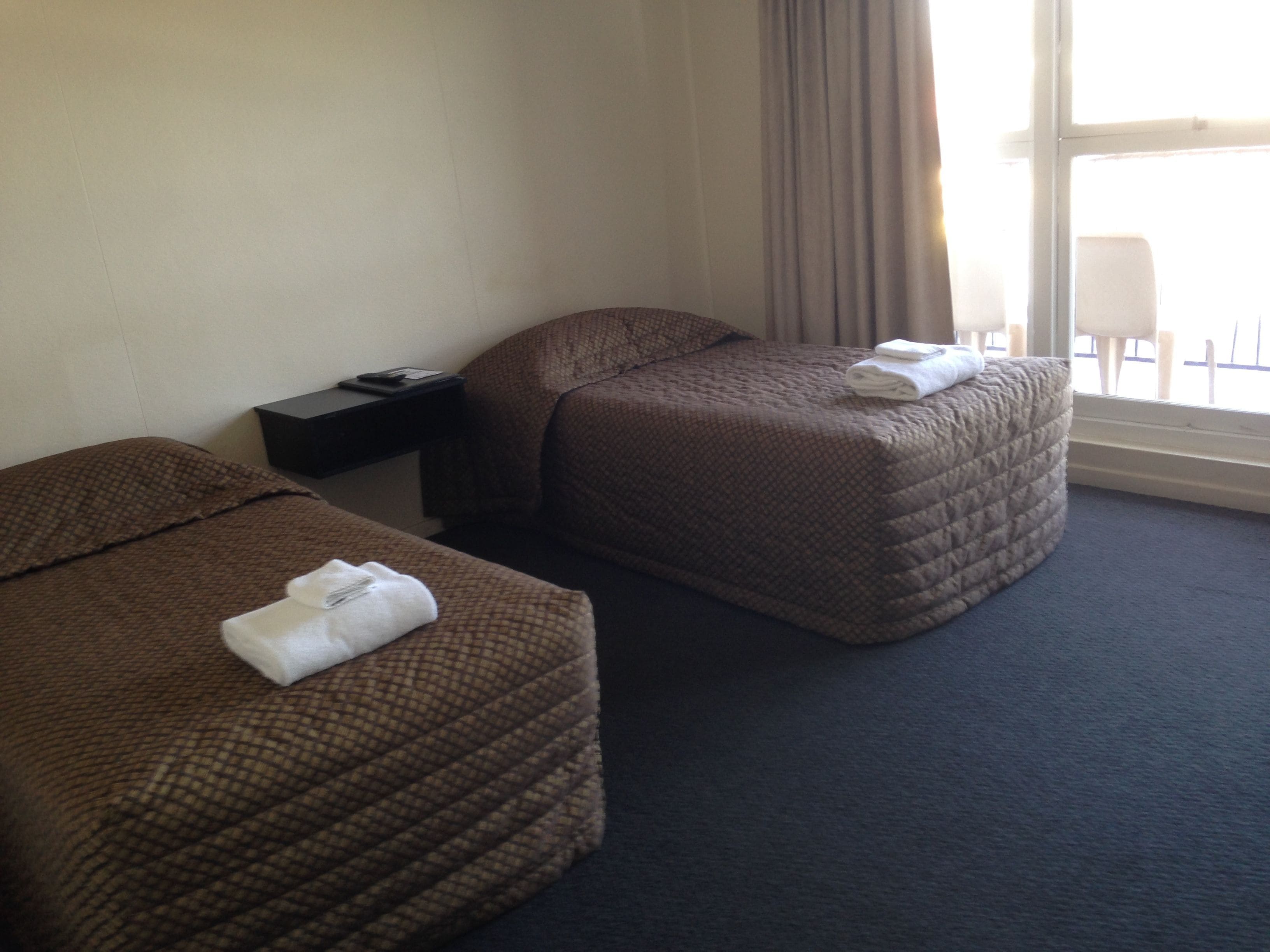 hotel twin share, shared bathroom | down duvets, iron/ironing board, free cots/infant beds, free wifi