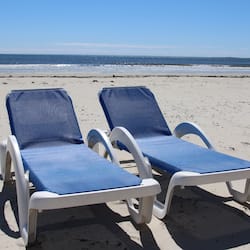 On the beach, beach cabanas, sun-loungers