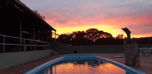 Indoor pool, outdoor pool, open 10:00 AM to 8:00 PM, pool umbrellas