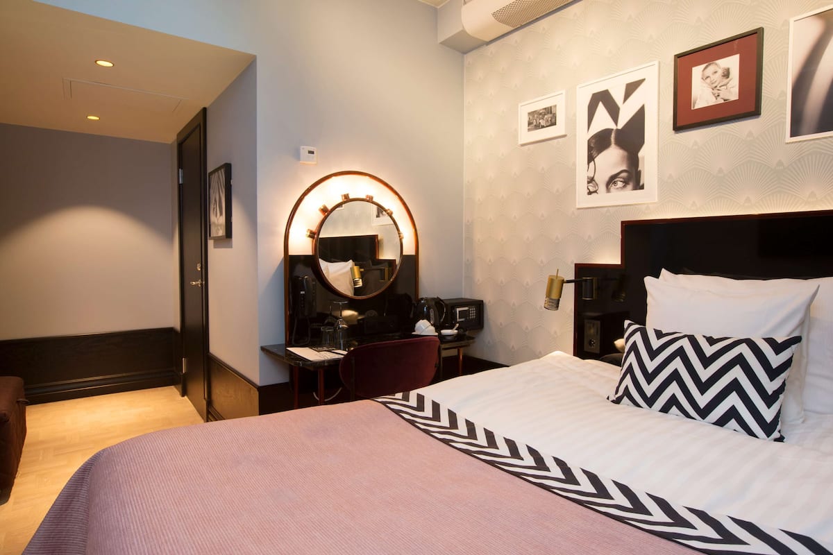 In-room safe, desk, blackout curtains, iron/ironing board