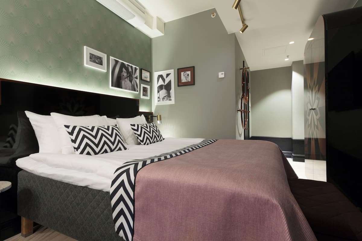 In-room safe, desk, blackout curtains, iron/ironing board