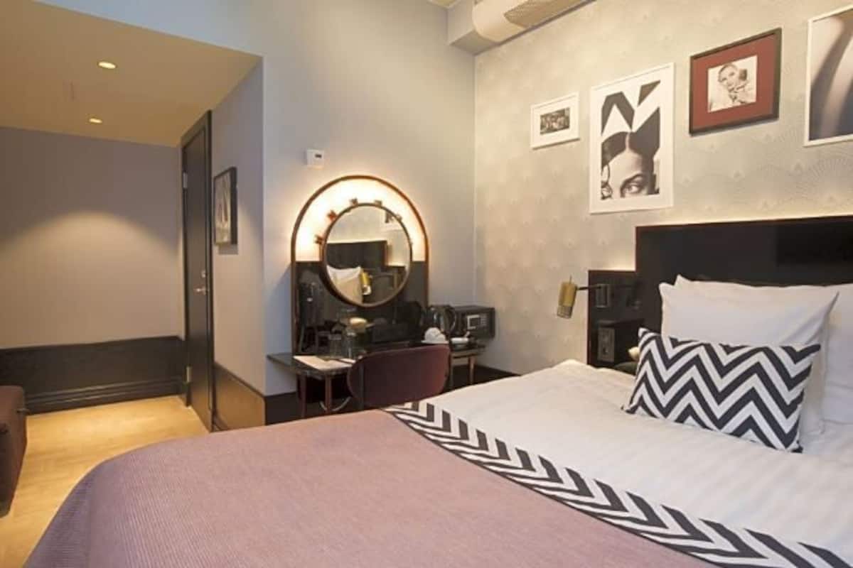 In-room safe, desk, blackout curtains, iron/ironing board