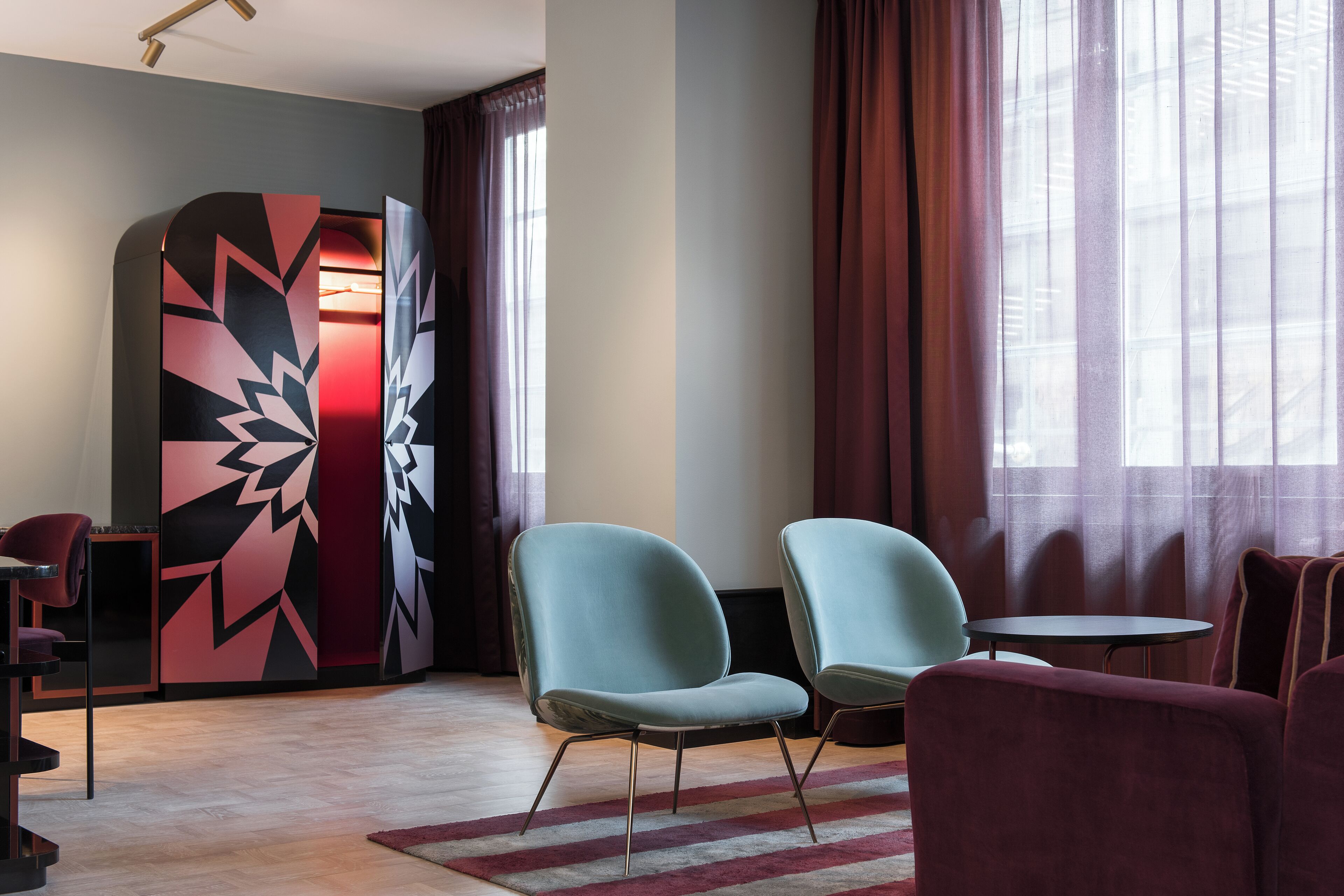 junior suite, city view | in-room safe, desk, blackout curtains, iron/ironing board