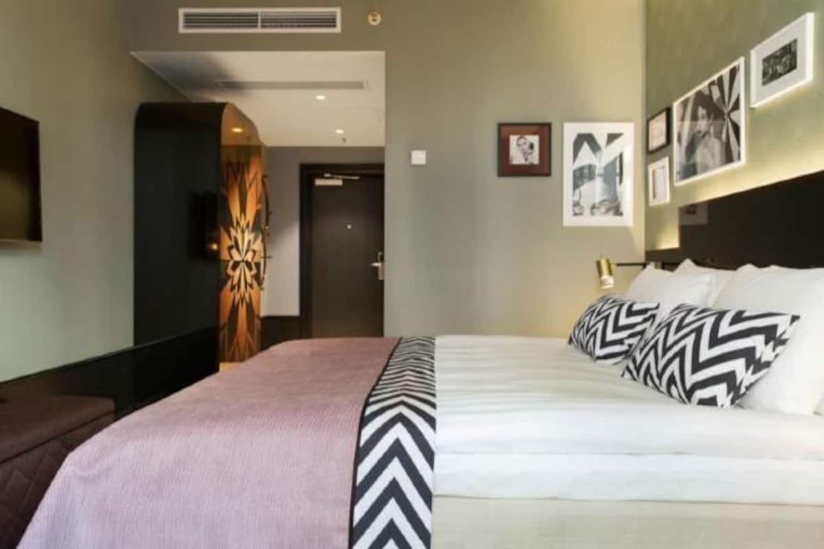 In-room safe, desk, blackout curtains, iron/ironing board