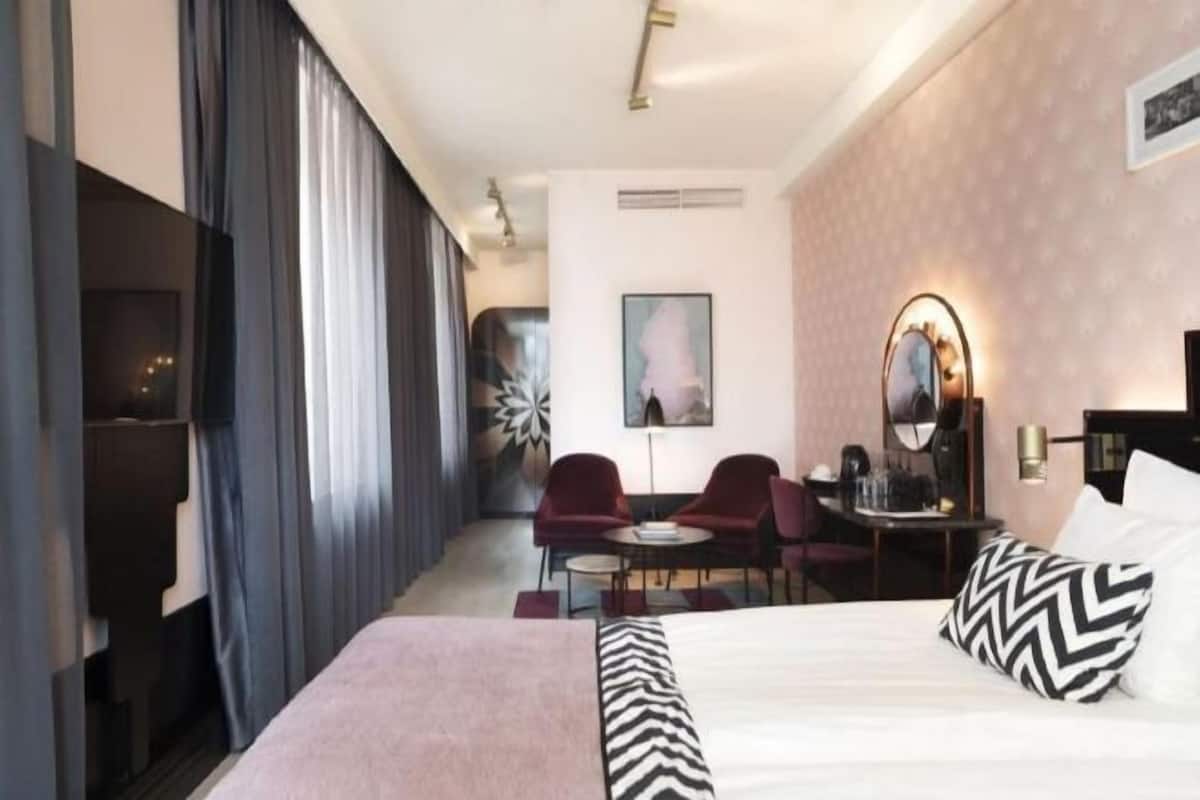 In-room safe, desk, blackout curtains, iron/ironing board