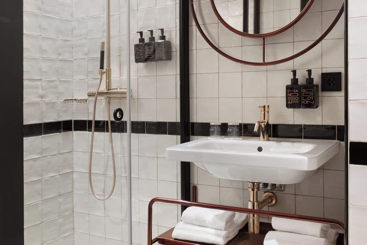 Shower, eco-friendly toiletries, hair dryer, towels