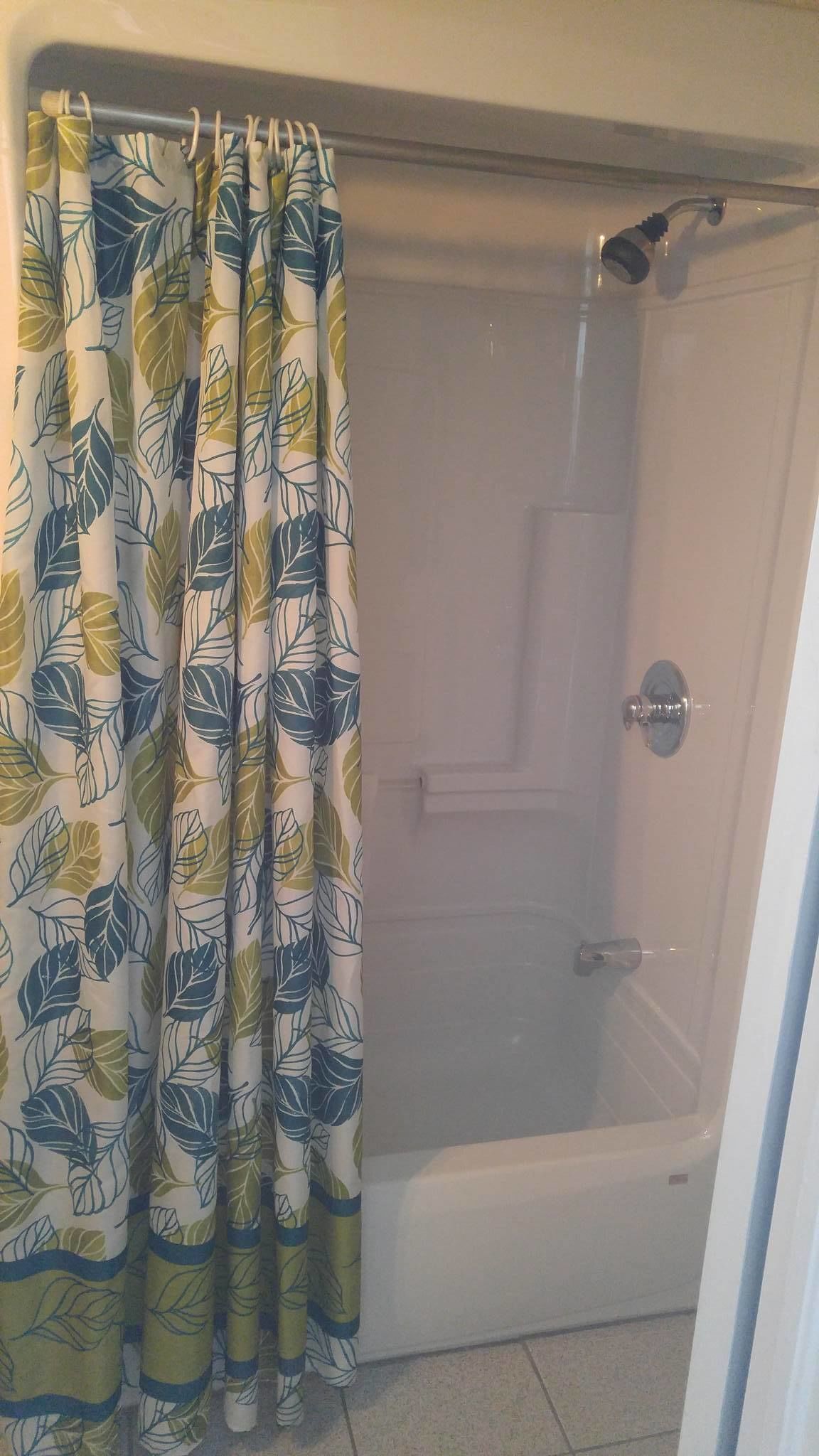 combined shower/bathtub, free toiletries, hair dryer, towels