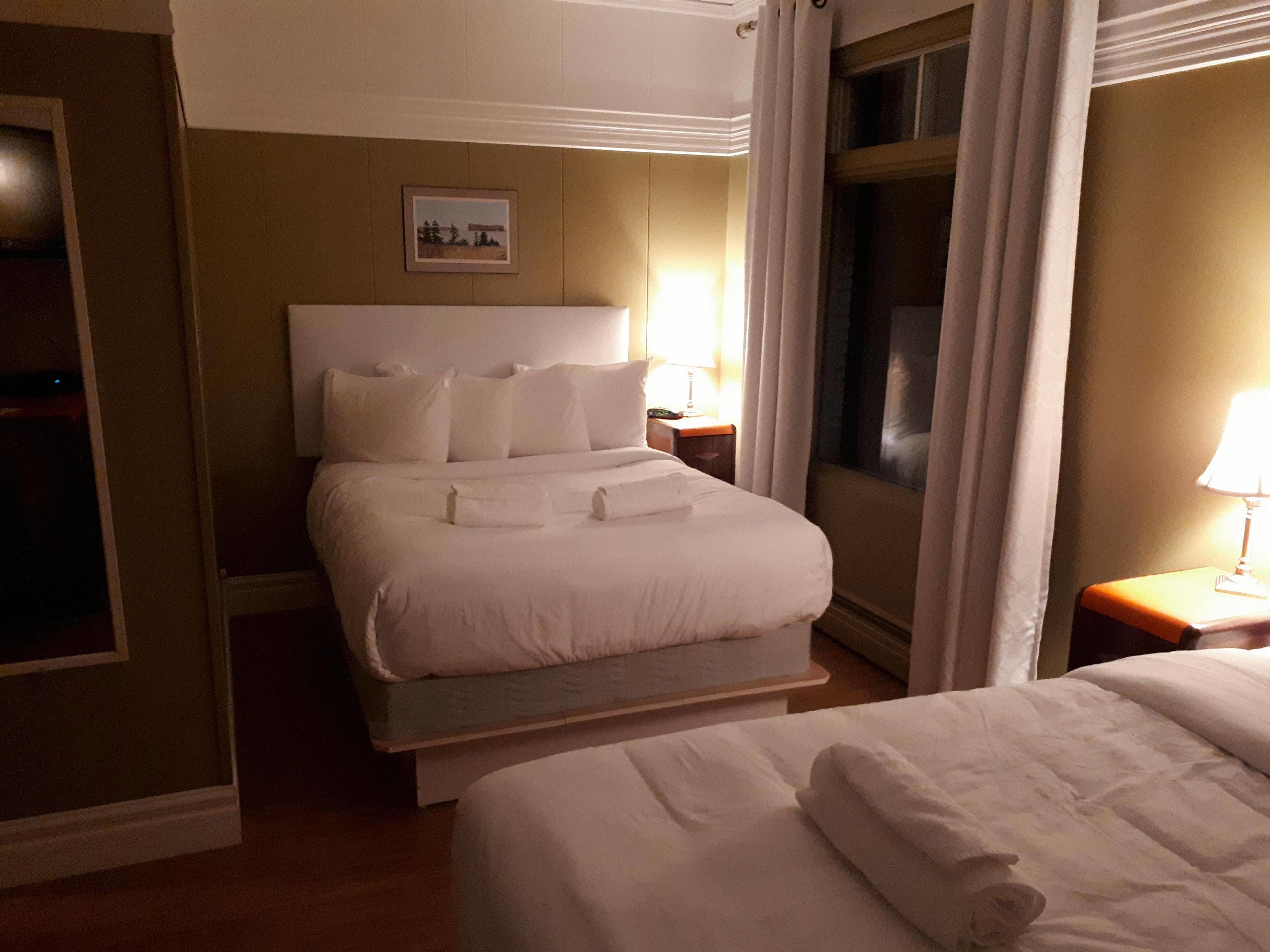 standard room, 2 double beds, non smoking, river view | hypo-allergenic bedding, desk, iron/ironing board, rollaway beds