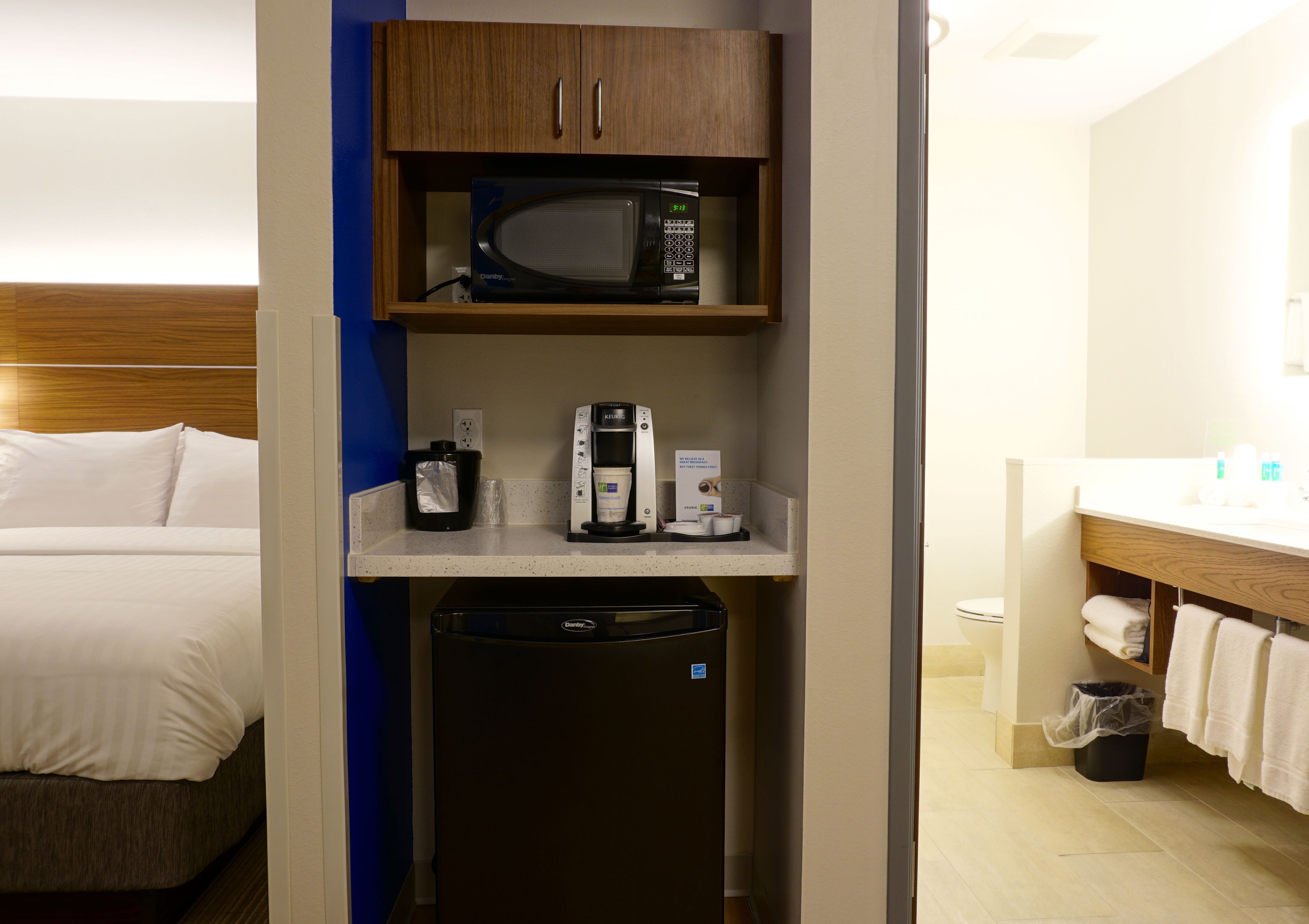 desk, laptop workspace, blackout curtains, iron/ironing board