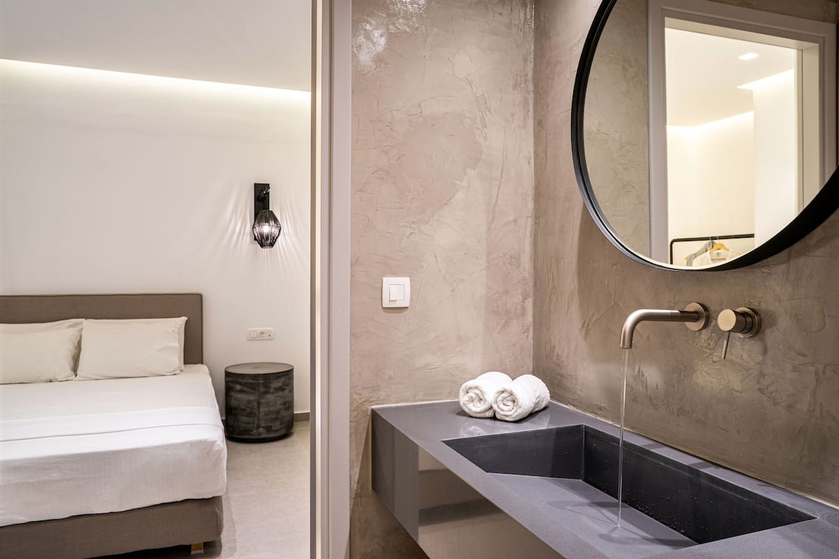 Junior Suite, Pool View | 1 bedroom, premium bedding, Tempur-Pedic beds, in-room safe