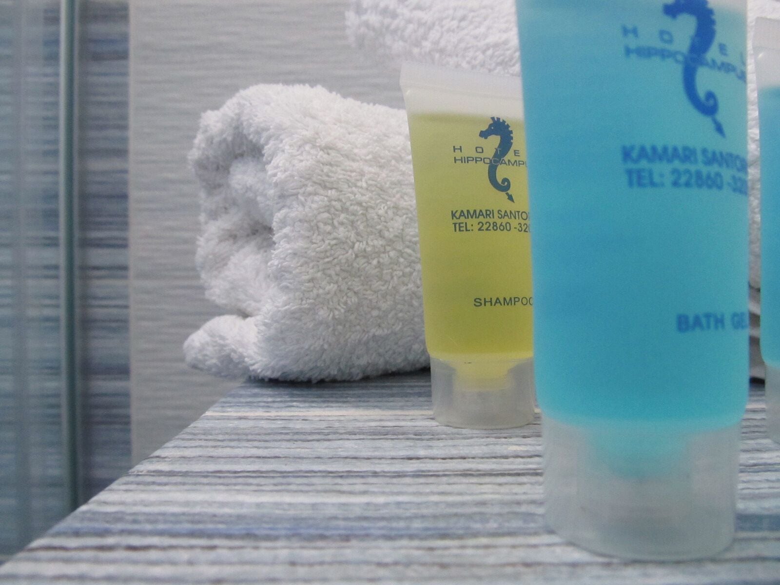 family studio | bathroom | shower, designer toiletries, hair dryer, towels