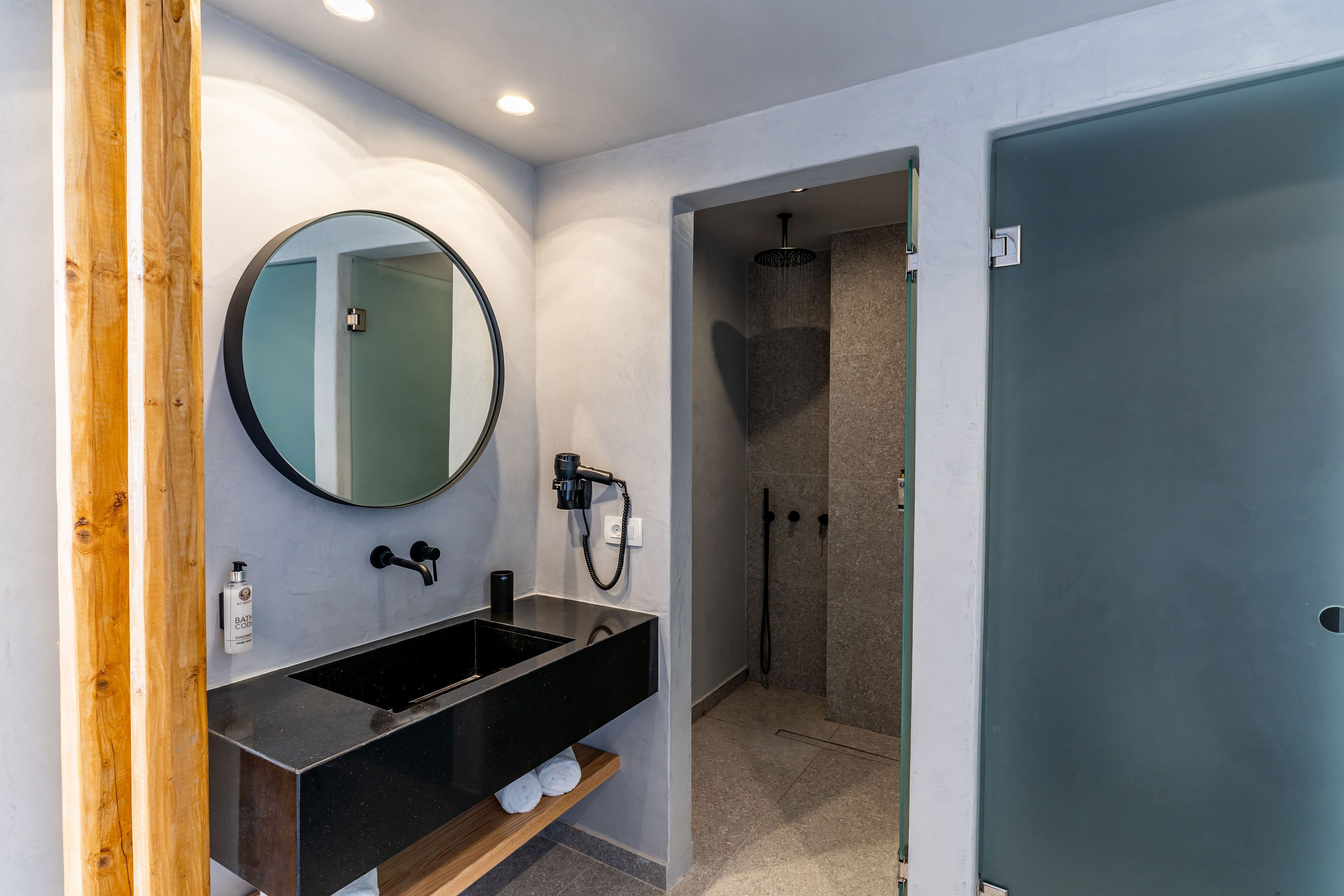 junior suite, pool view with plunge pool | bathroom | shower, designer toiletries, hair dryer, towels