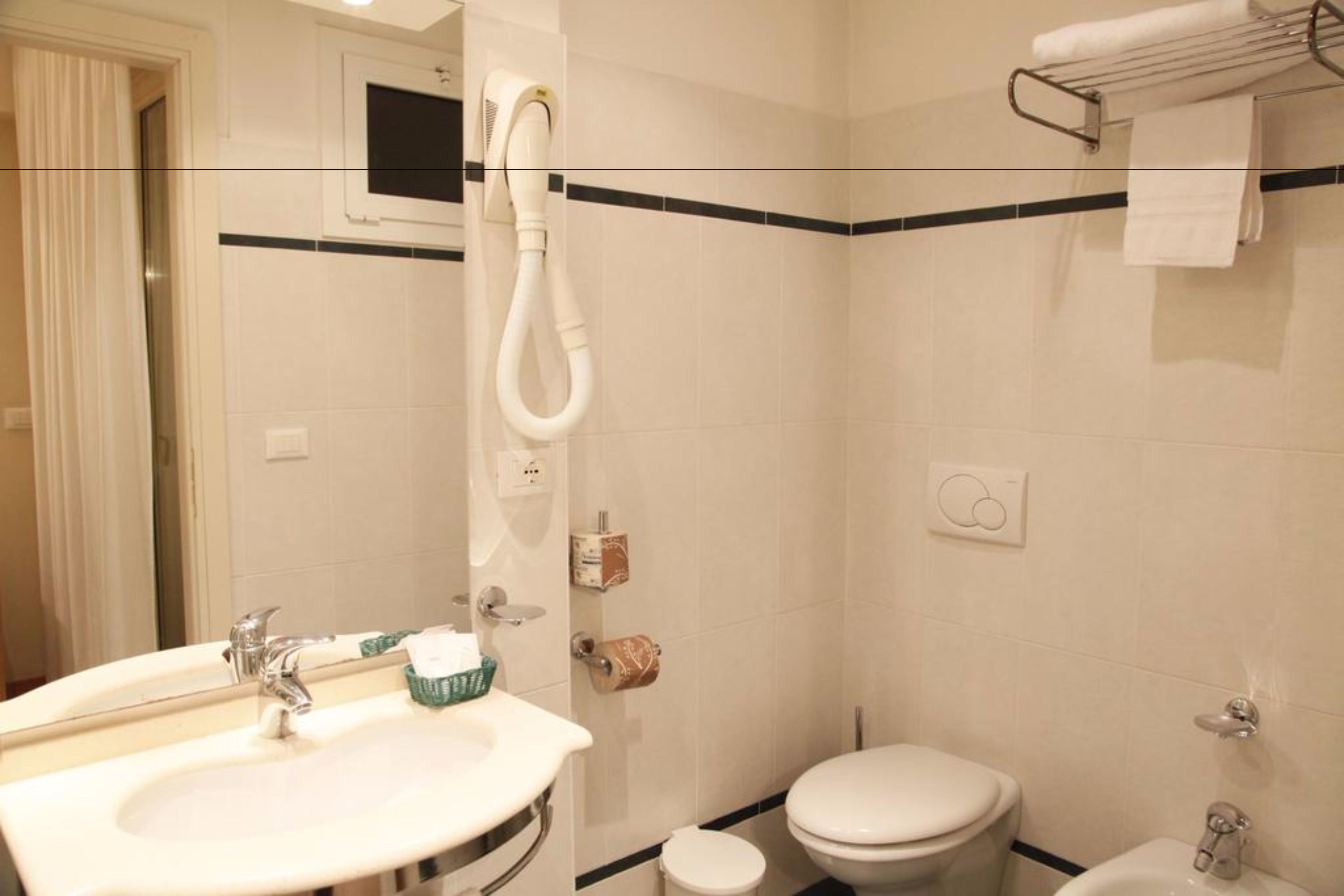 shower, free toiletries, hair dryer, bidet