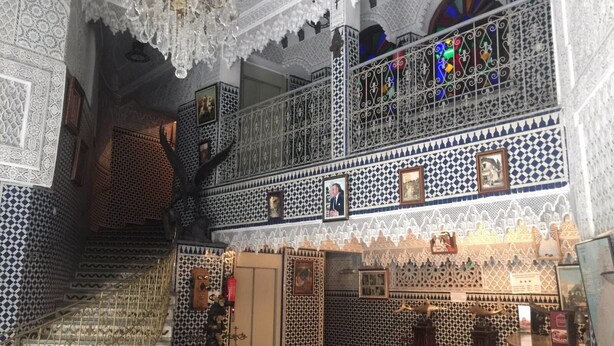 A multi-level interior with ornate tile work, a staircase, and a balcony with a view. - Hotel Al Mamoun (Casablanca)