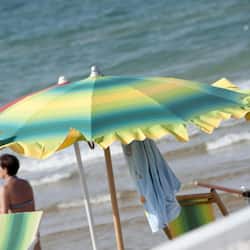 On the beach, sun loungers, beach umbrellas