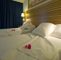 Desk, laptop workspace, blackout drapes, iron/ironing board