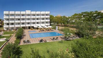 Outdoor pool, open 9:00 AM to 6:00 PM, pool umbrellas, sun loungers