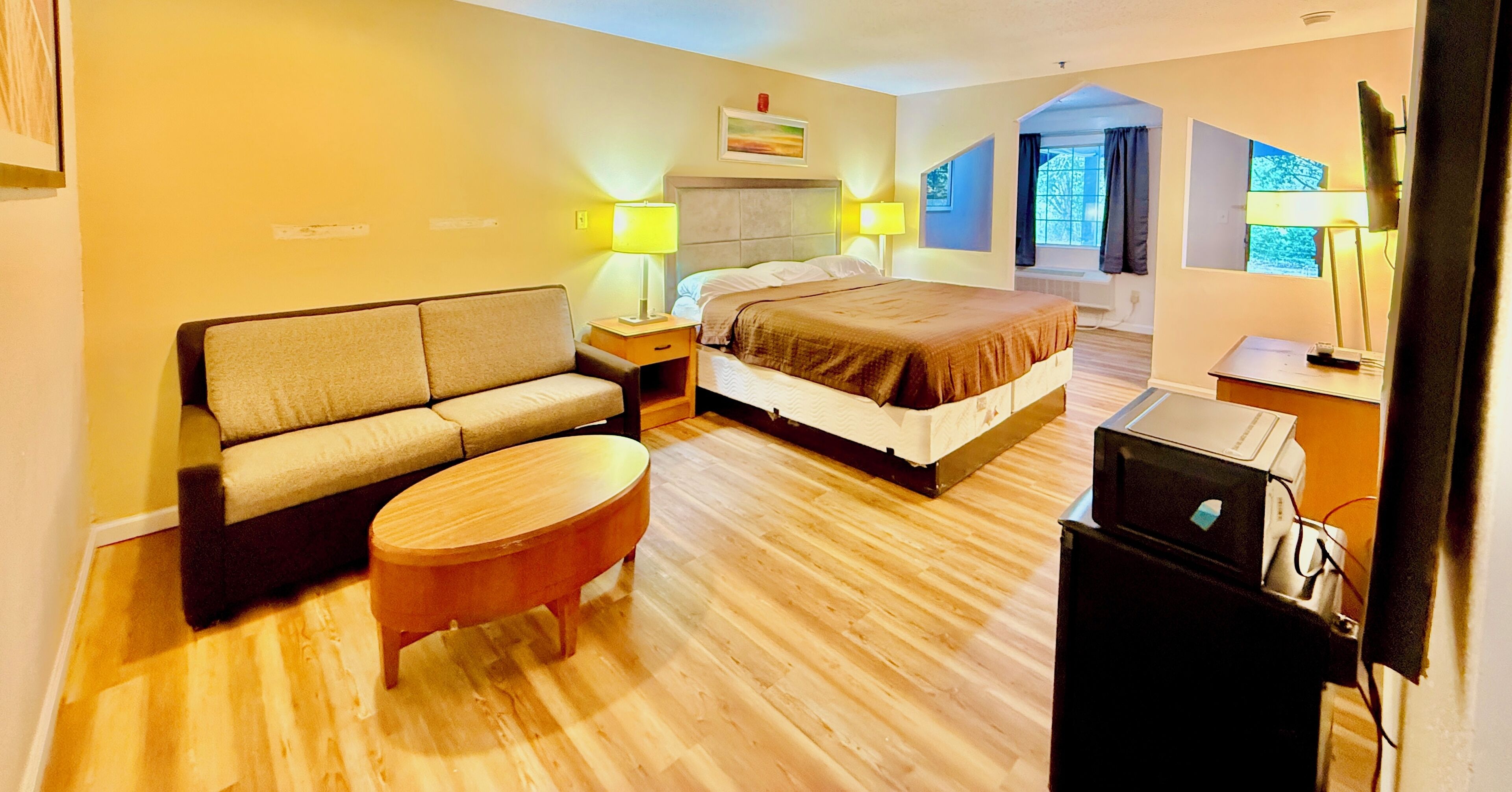 Suite, 1 King Bed, Non Smoking | Desk, iron/ironing board, free WiFi, bed sheets