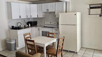 Superior Studio, 2 Queen Beds | Private kitchen | Fridge, microwave, coffee/tea maker