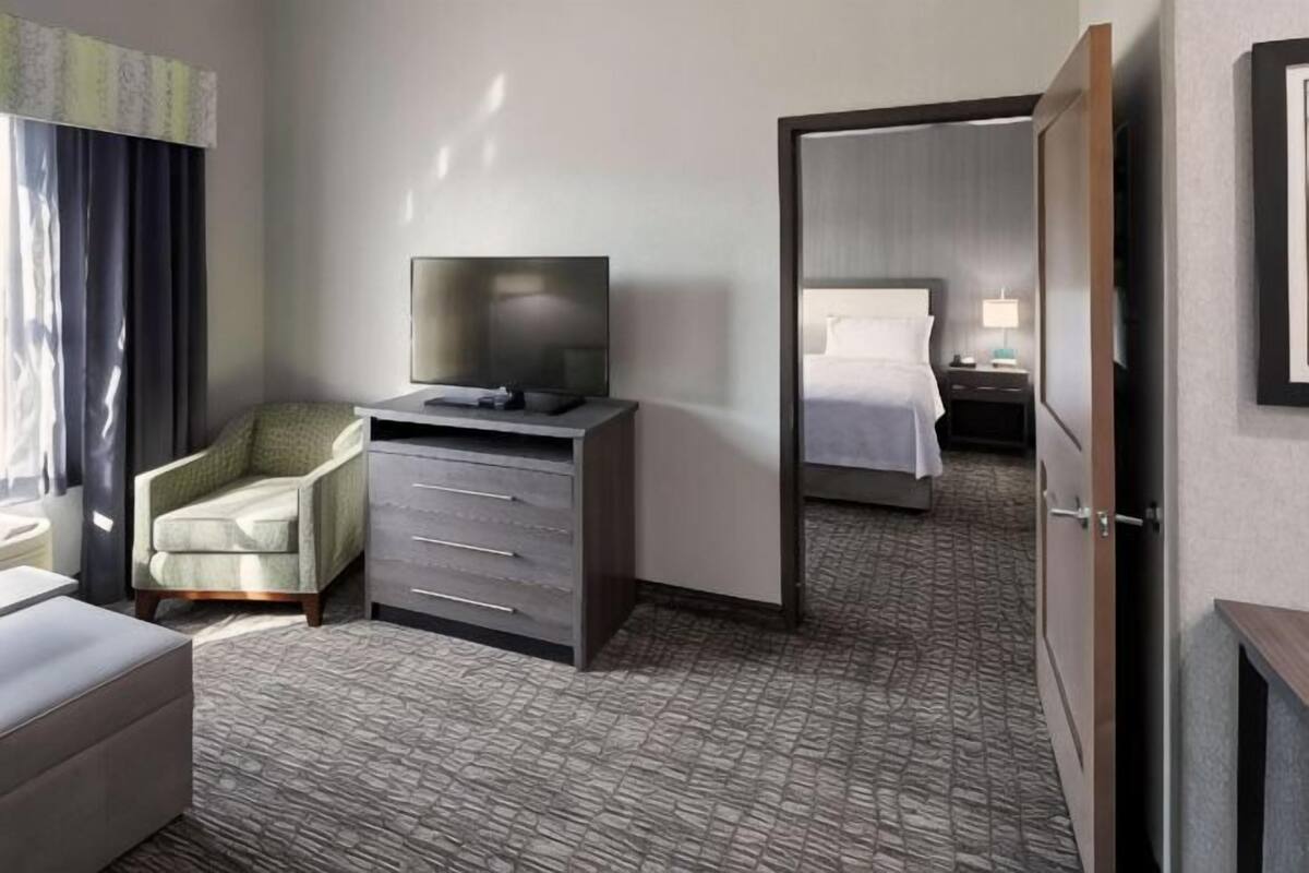 Hypo-allergenic bedding, in-room safe, blackout drapes