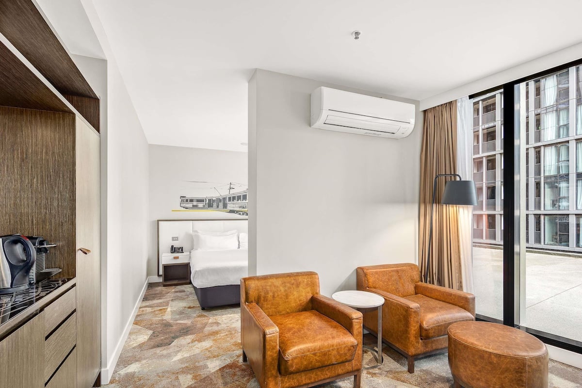 Premium bedding, pillow-top beds, minibar, in-room safe